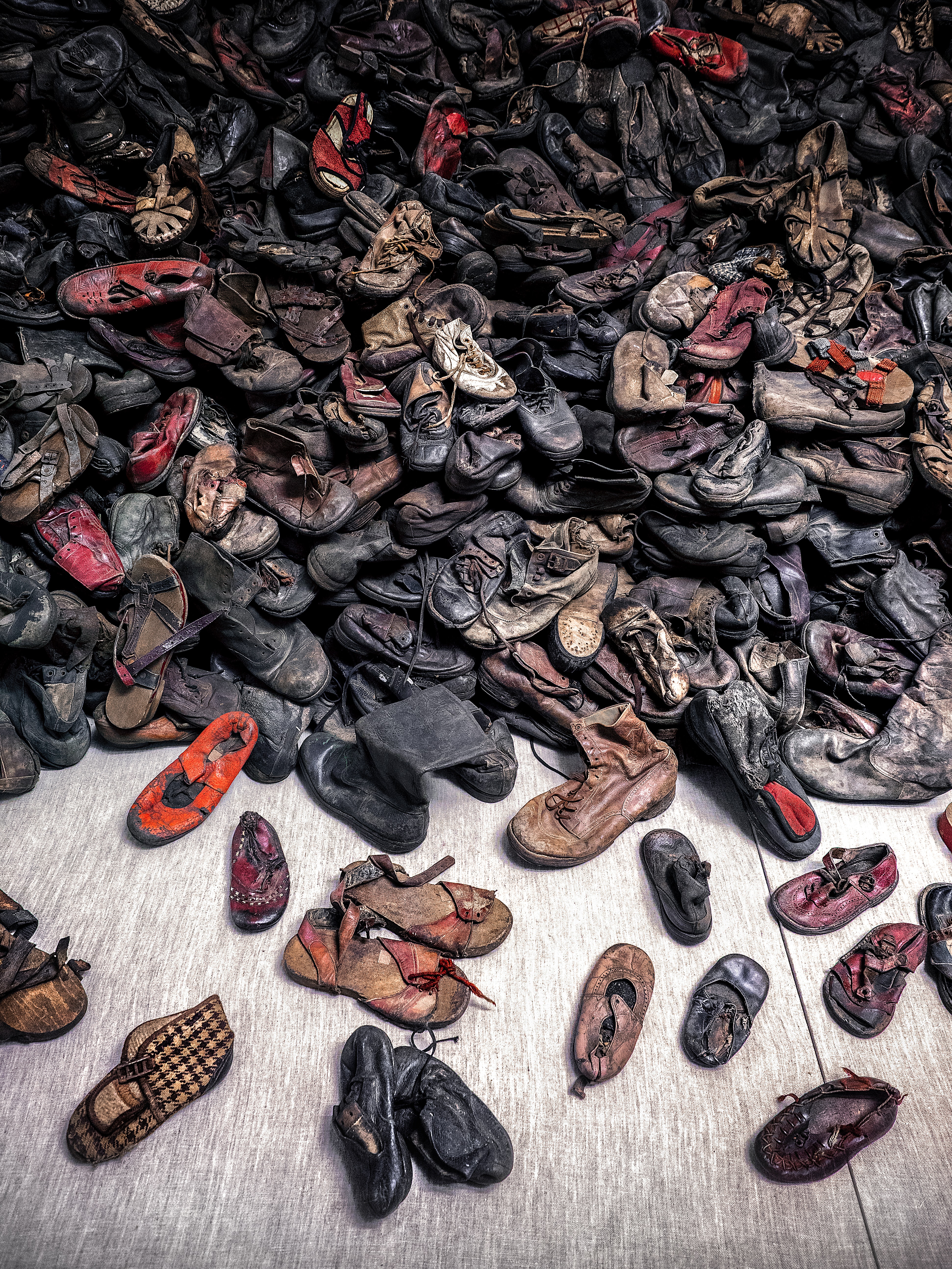 Auschwitz pile of leather shoes from Holocaust concentration camp 